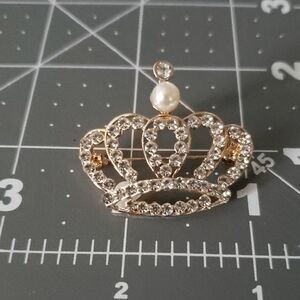 Elegant Gold and Silver Crown Brooch